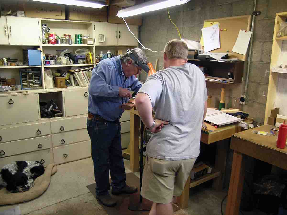 Steven Dodd Hughes demonstrating technique during the Stockmaking class.